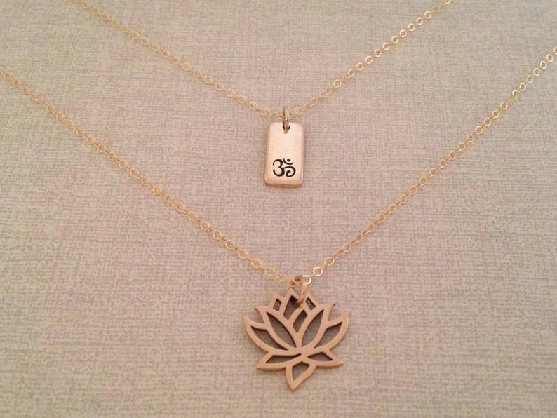 Ohm and lotus layered necklace set
